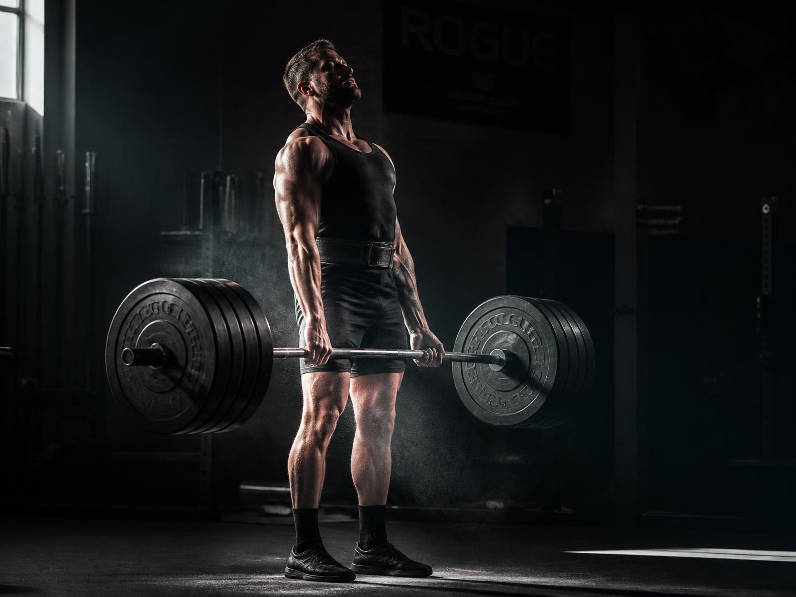Member locking out a deadlift on the Ironhall competition platform